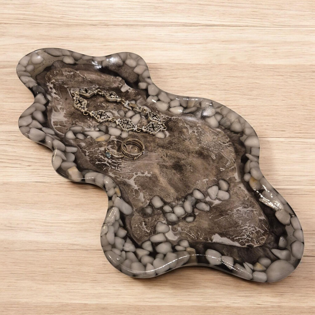 Handcrafted marble-effect tray with a unique wavy design - elegant, modern, and one of a kind.